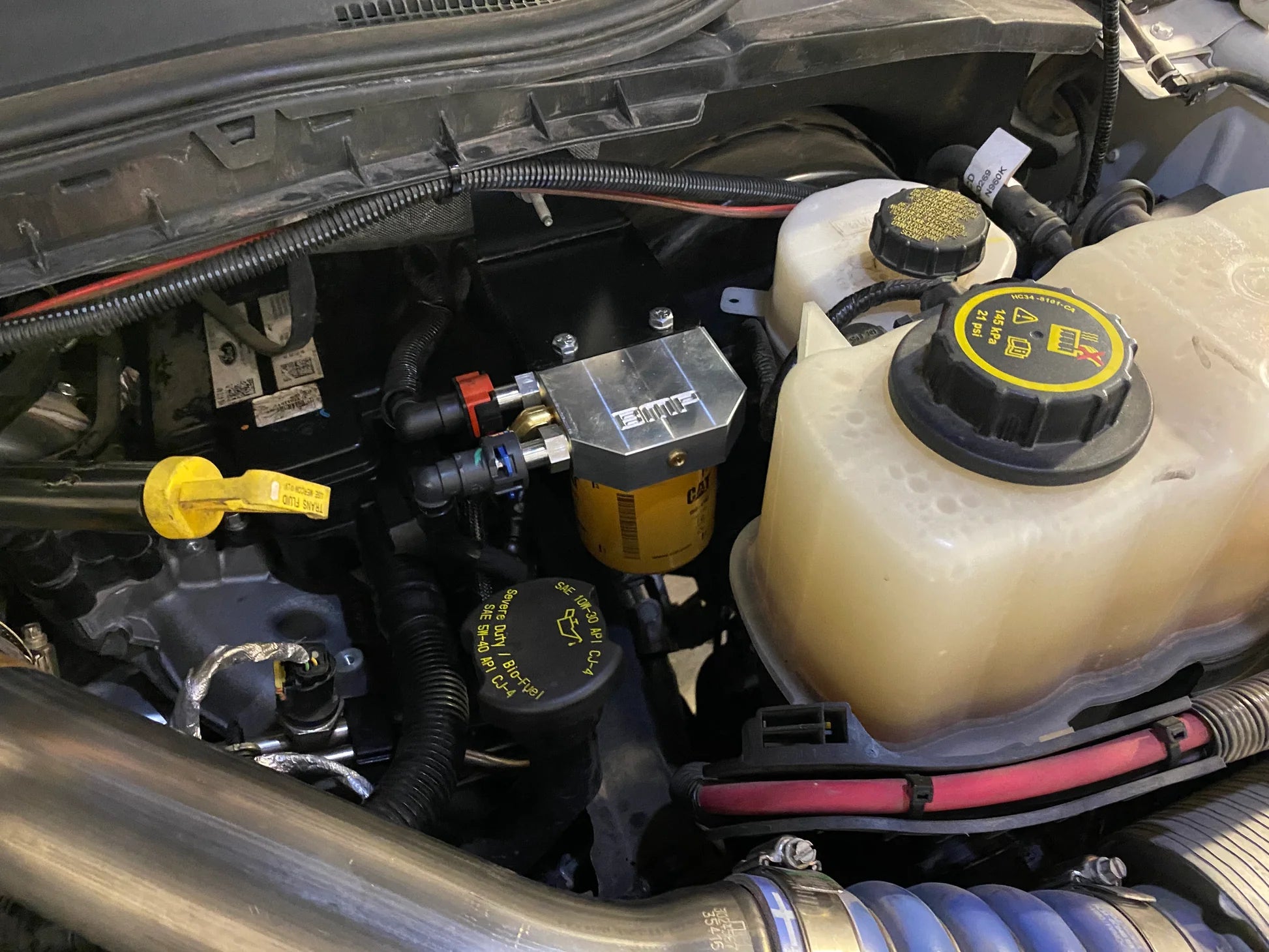 20-24 6.7 Powerstroke Cat Fuel Filter Adapter & Fuel Bowl Delete - Auction - The Diesel Market Place